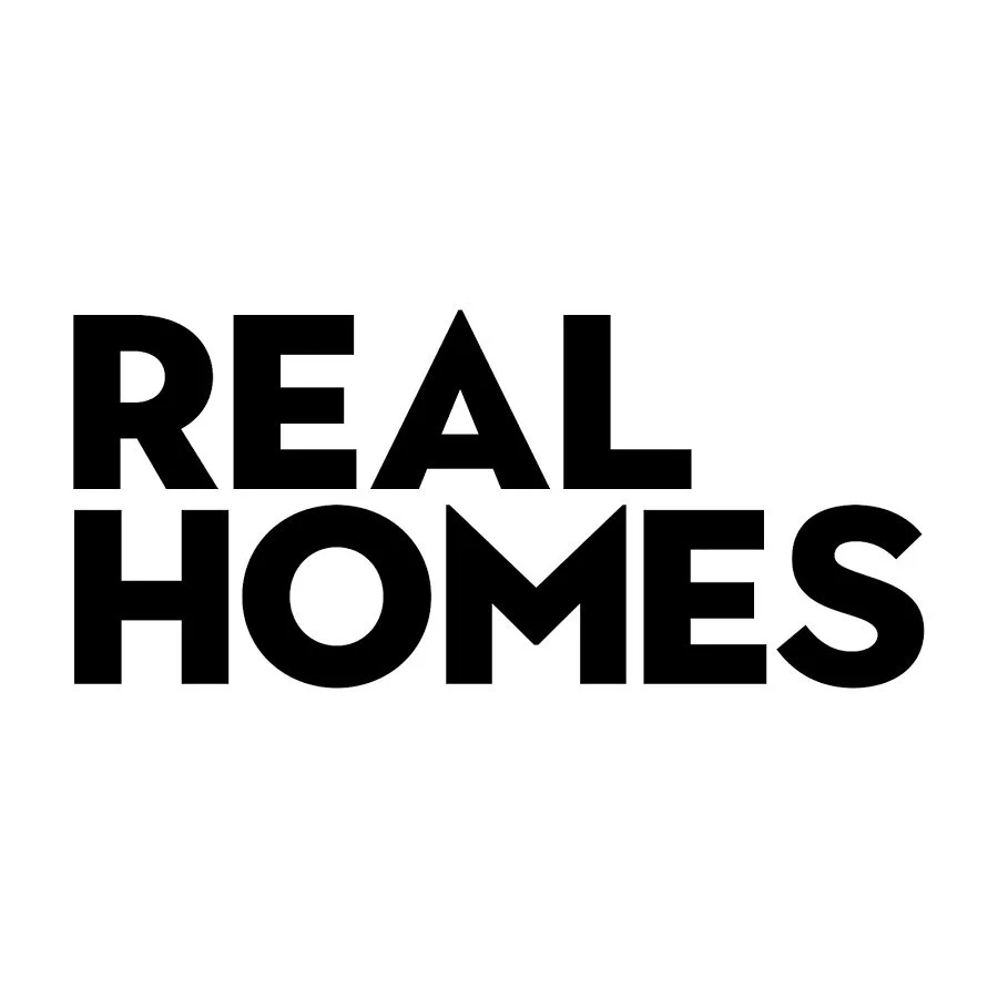 Featured in 'REAL HOMES' logo in bold black letters on a white background.