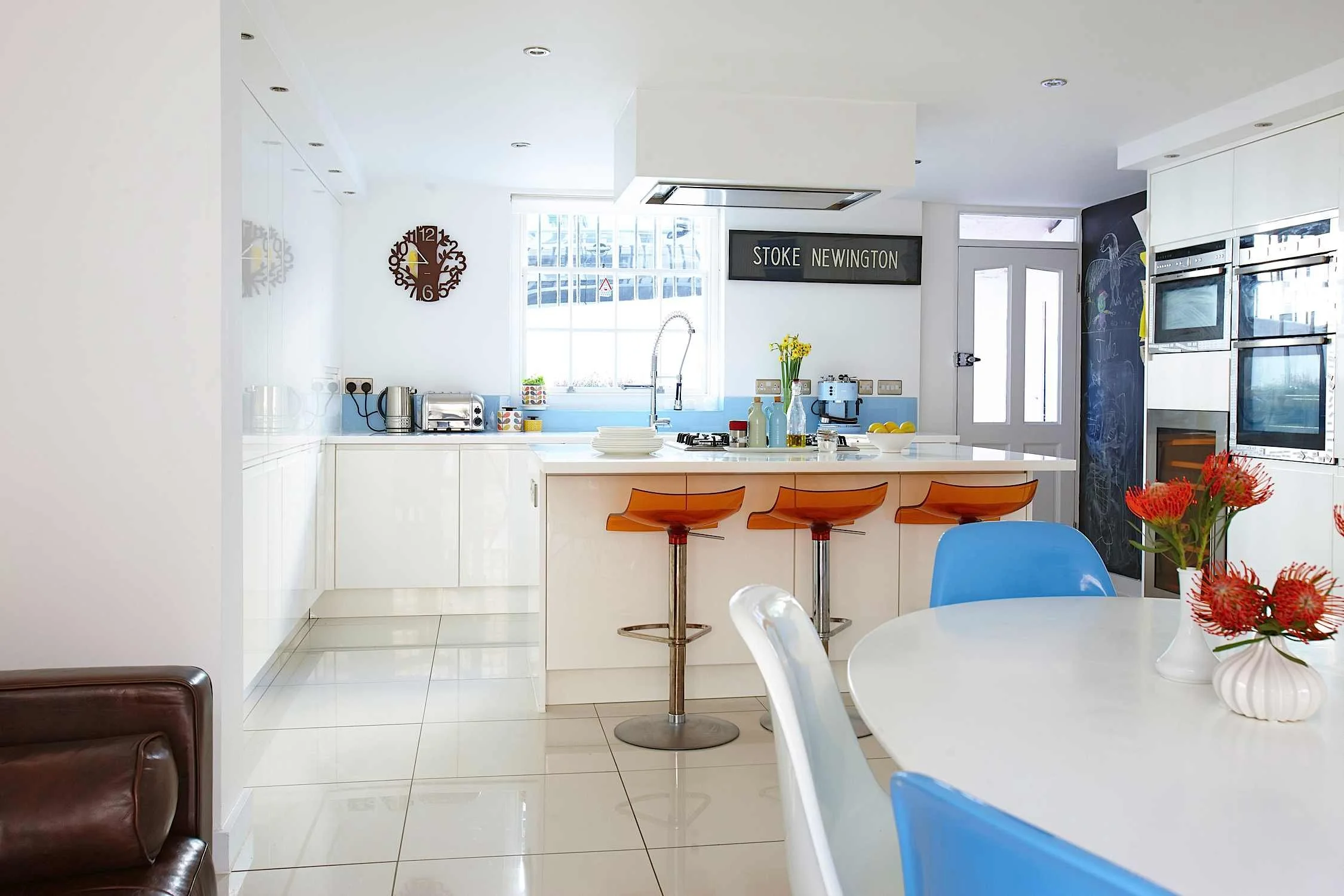 Bright kitchen staged to showcase space and functionality to buyers.