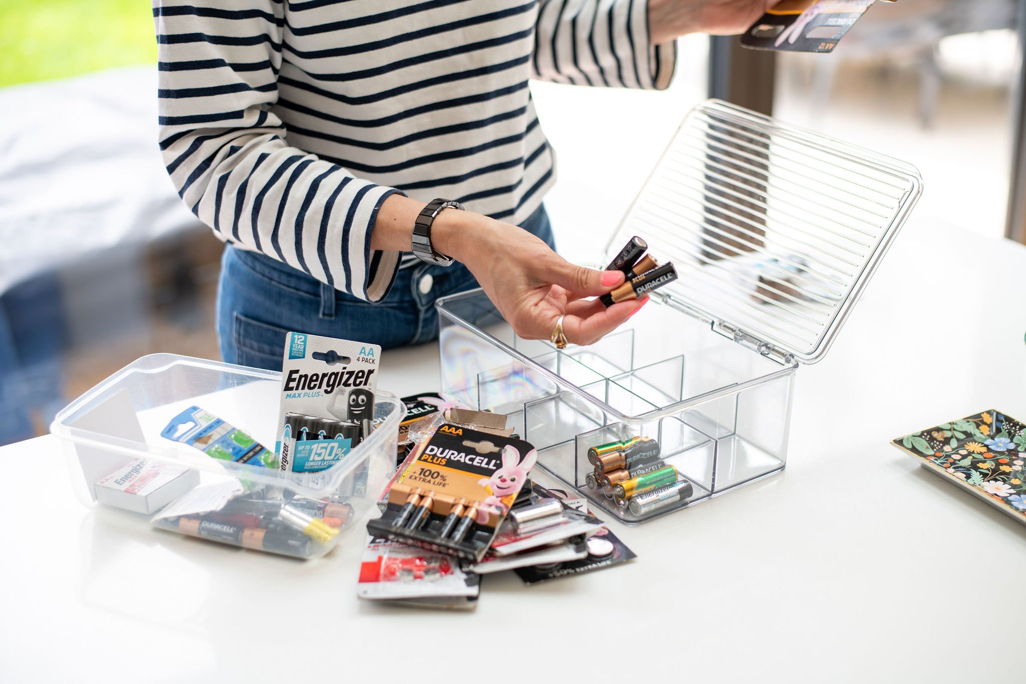 Professional home organiser creating simple storage systems for household items and everyday essentials.
