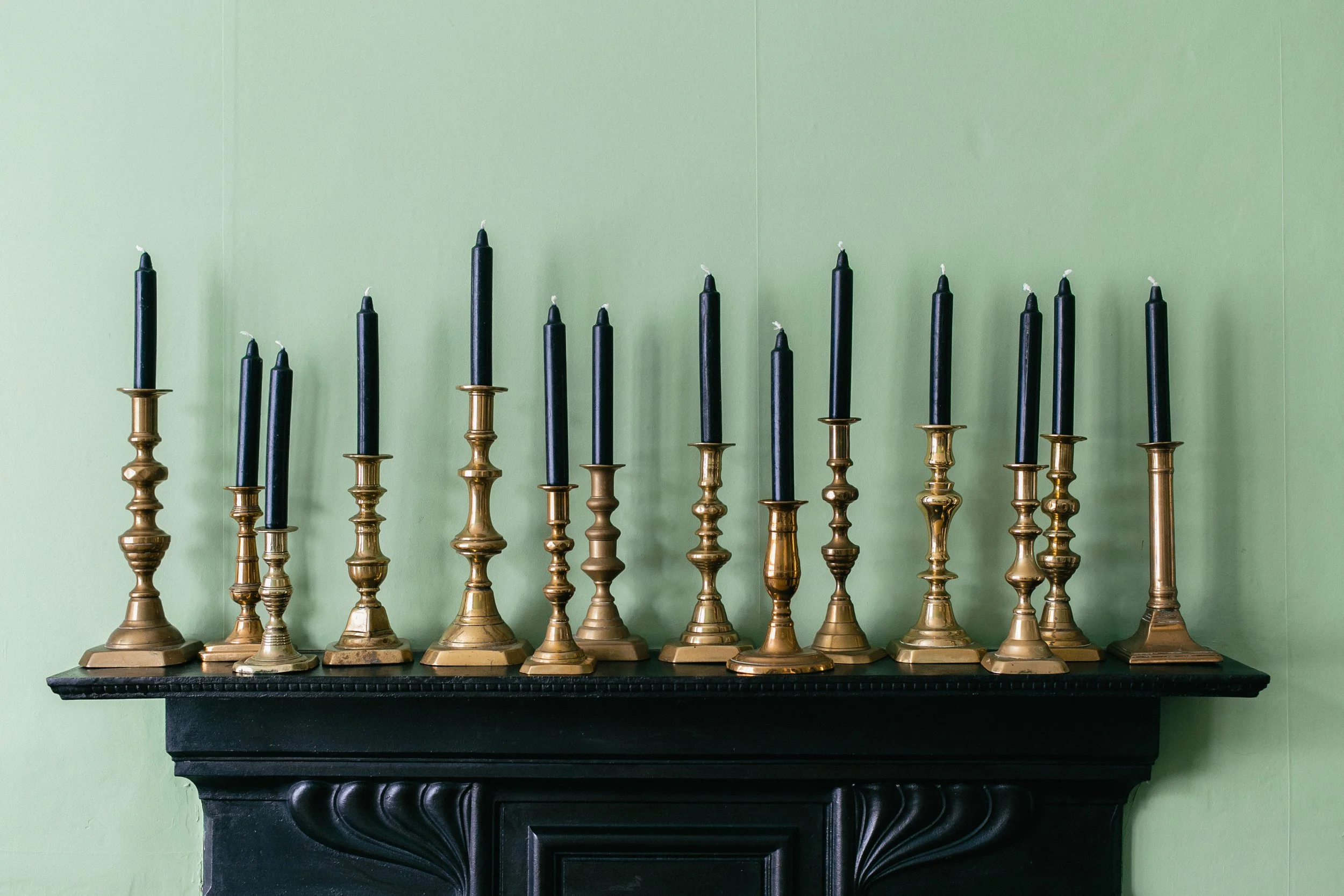 Styled mantelpiece with decorative accessories and layered textures.