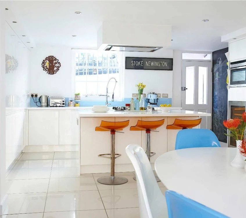 Professionally staged open-plan kitchen and dining space designed to feel bright, spacious and welcoming