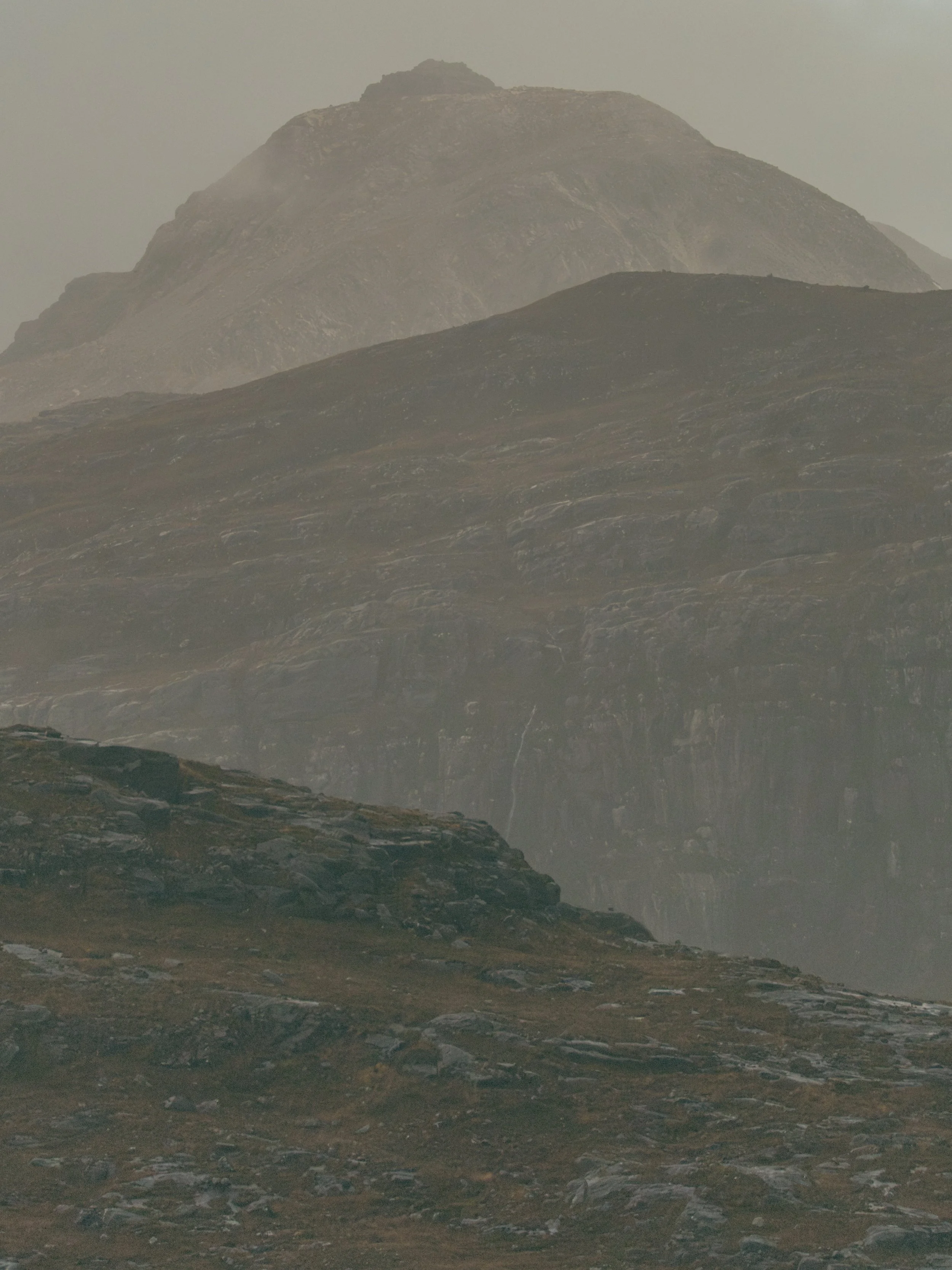 Scottish Highlands moody mountain and waterfall
