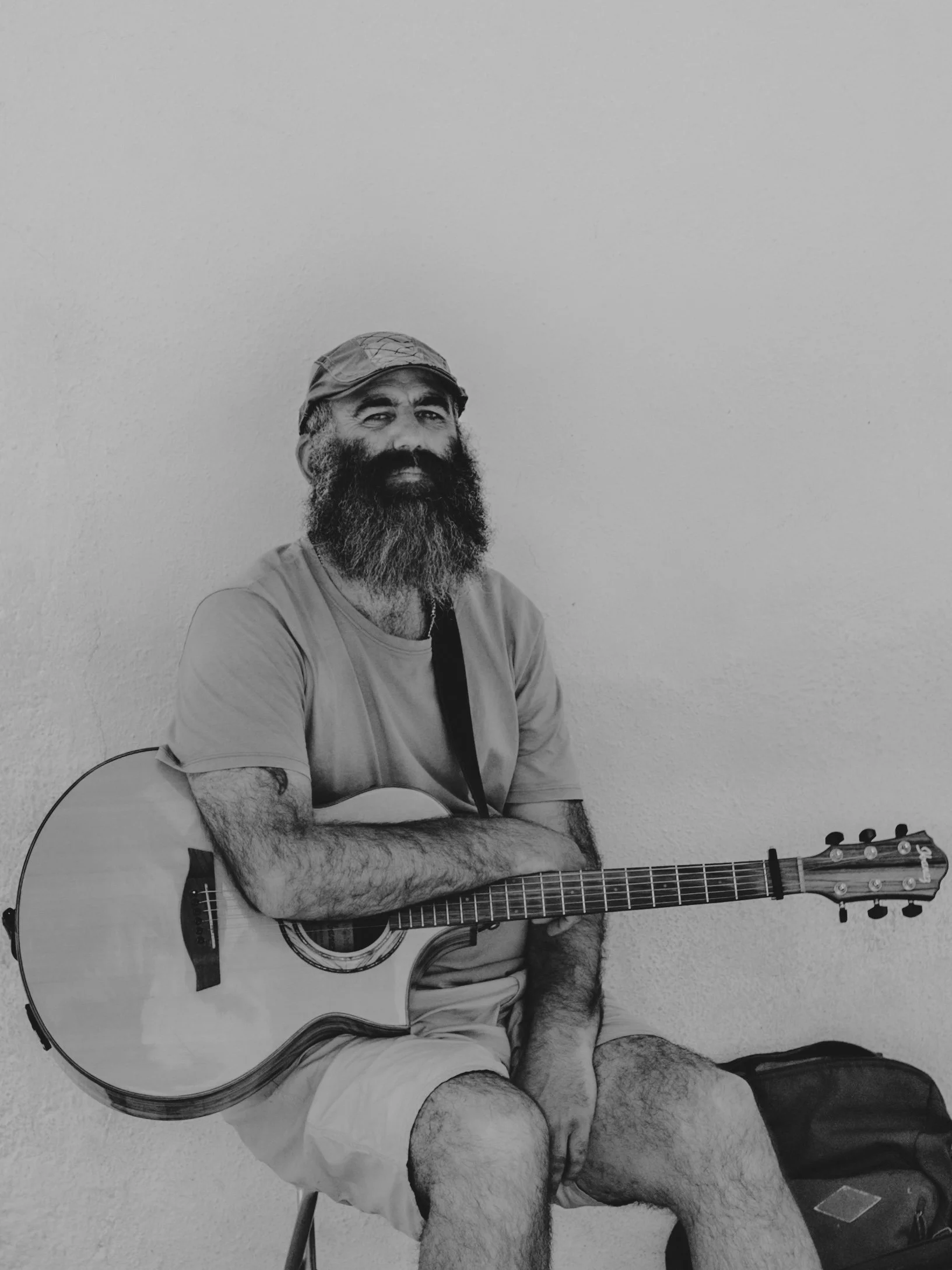 Spanish busker musician with guitar in Granada