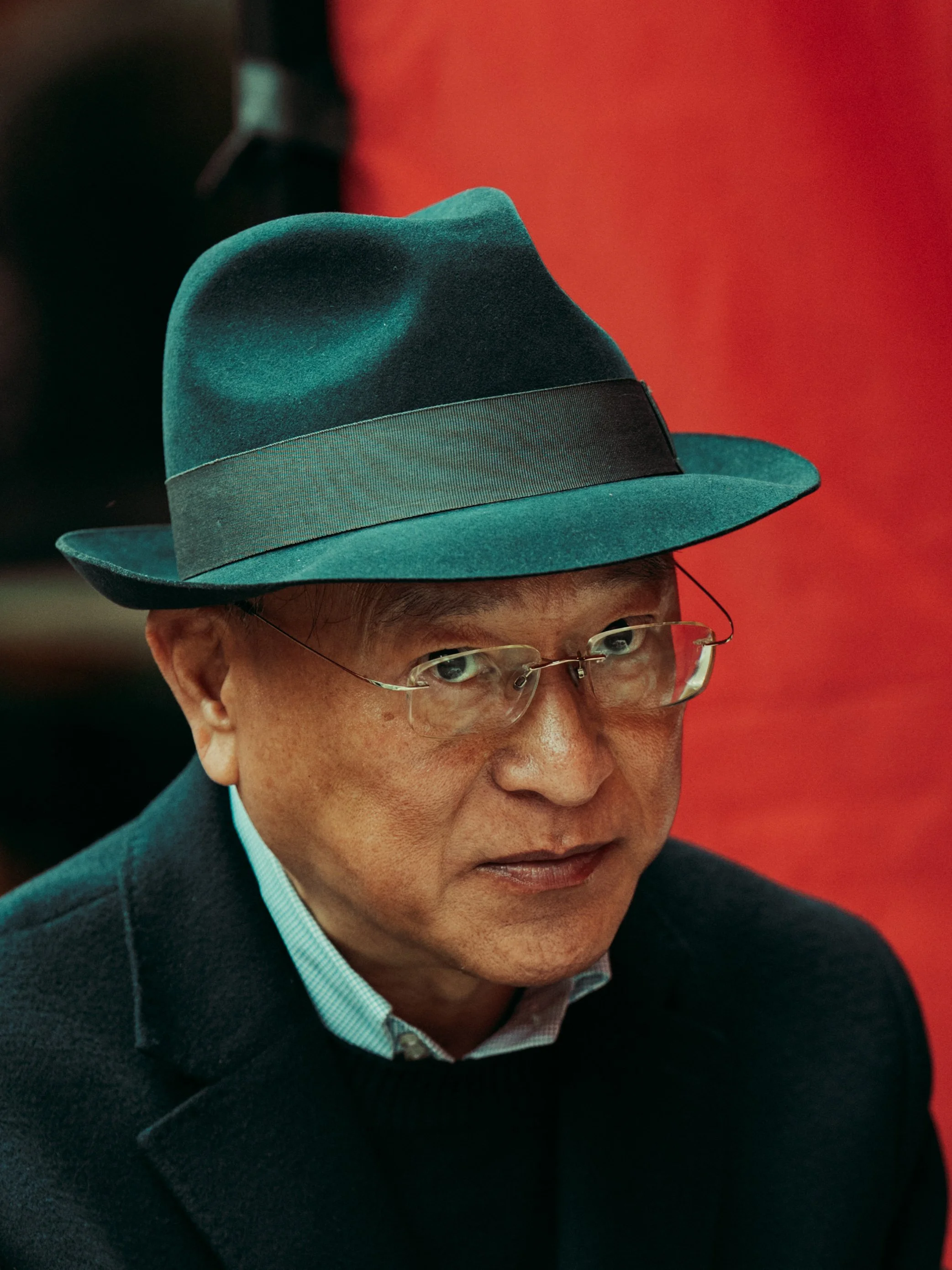 Portrait of Asian man in Chinatown London staring the camera 
