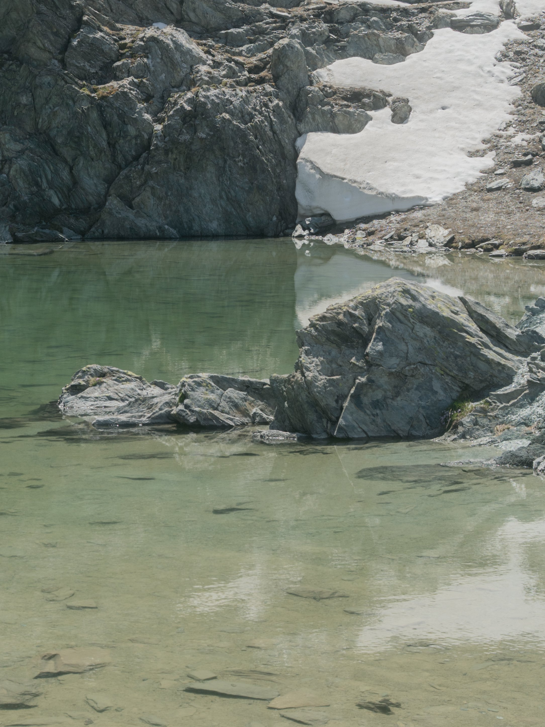 Green glacial lake in Alps
