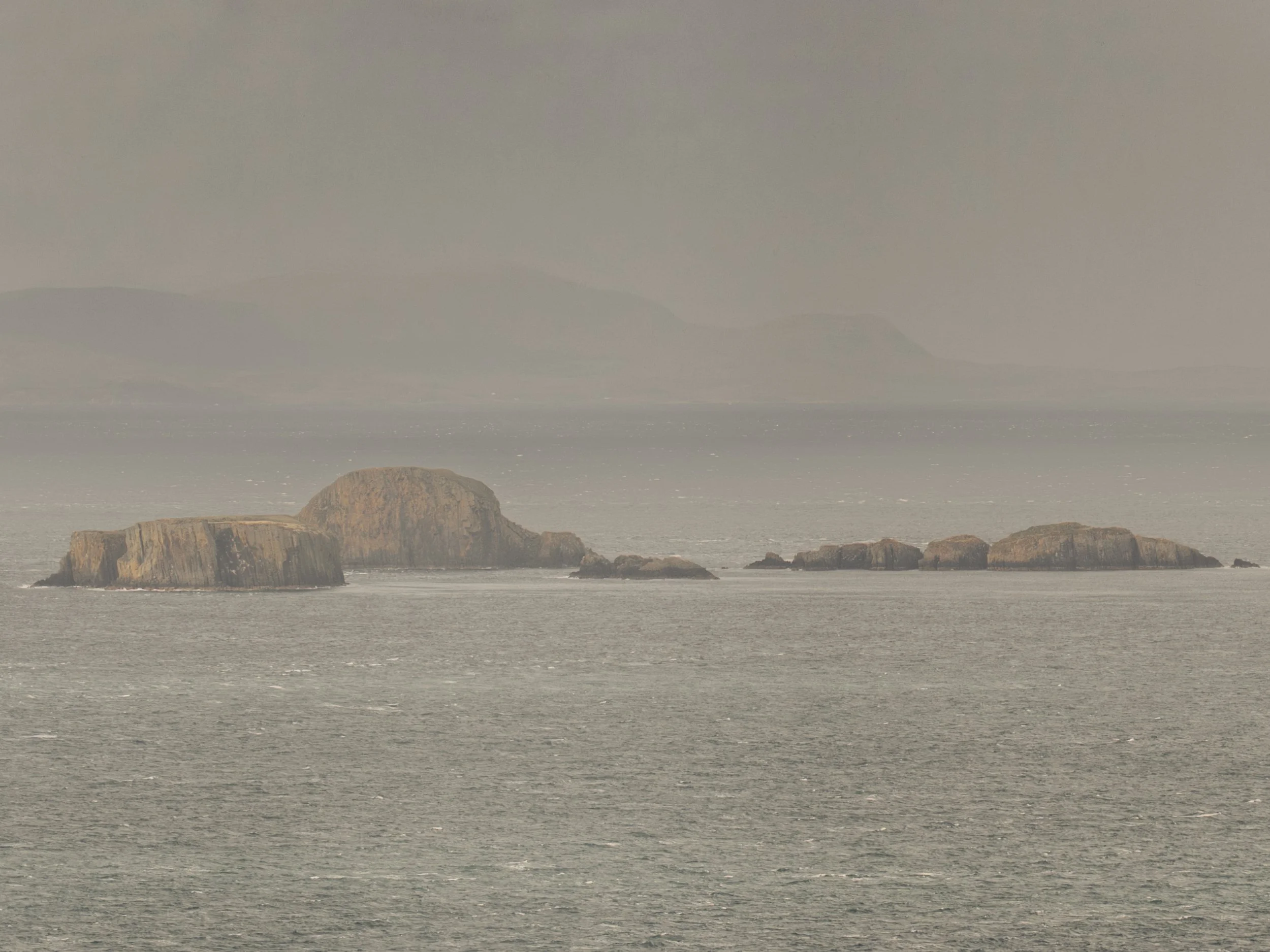 Rocky islands in the Atlantic Ocean off the coast of Isle of Skye