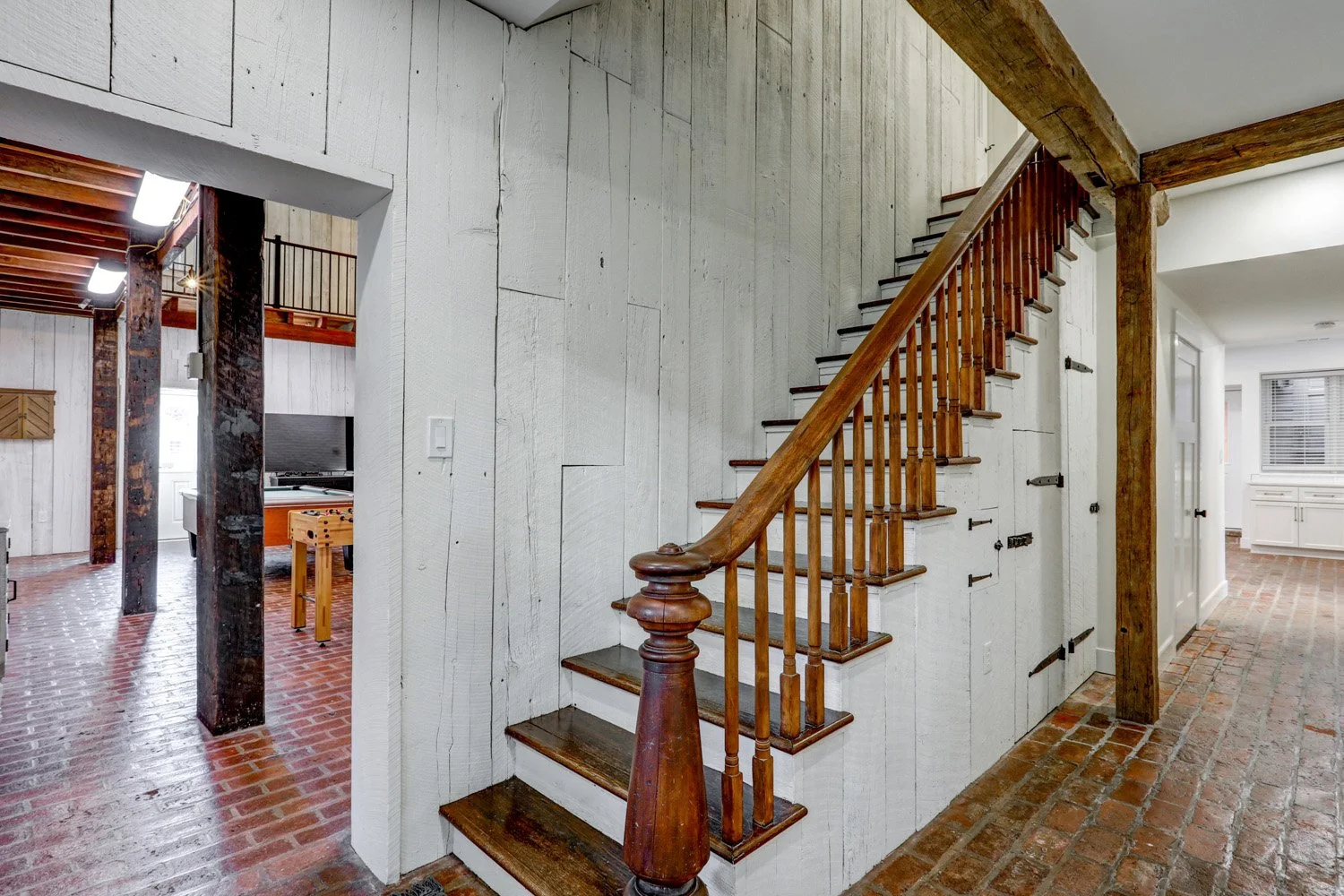 Staircase leading to the second floor of The Barn, where 4 bedrooms/4 bathrooms are on the second floor. 