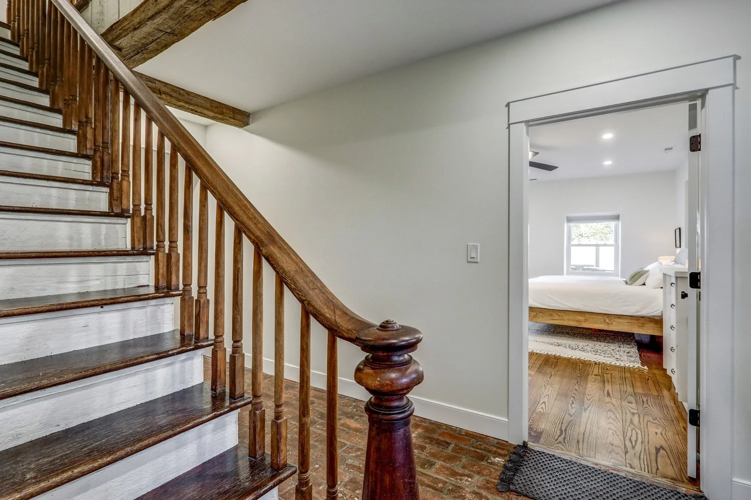 Staircase leading to the second floor of The Barn, where 4 bedrooms/4 bathrooms are on the second floor. 