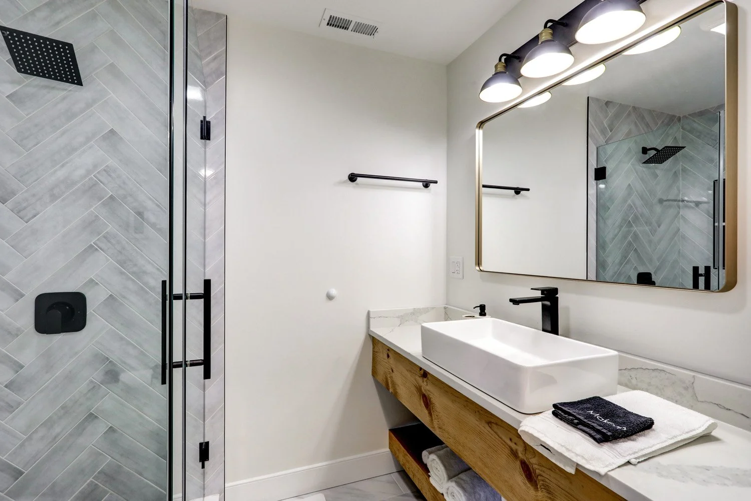 Bathroom 5 with a heated tile floor on the second floor of The Barn 