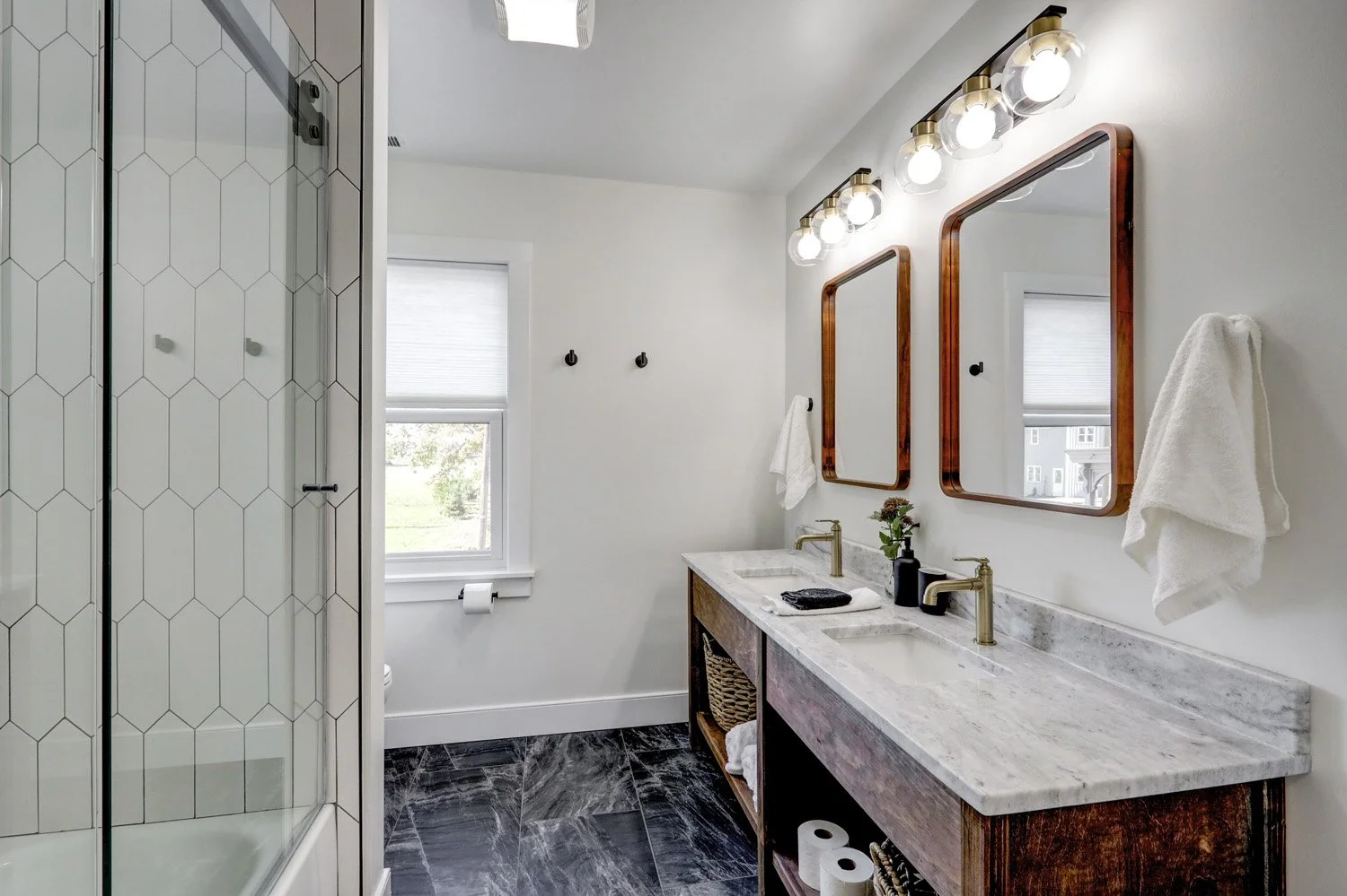 Bathroom 3 with a heated tile floor on the second floor of The Barn.