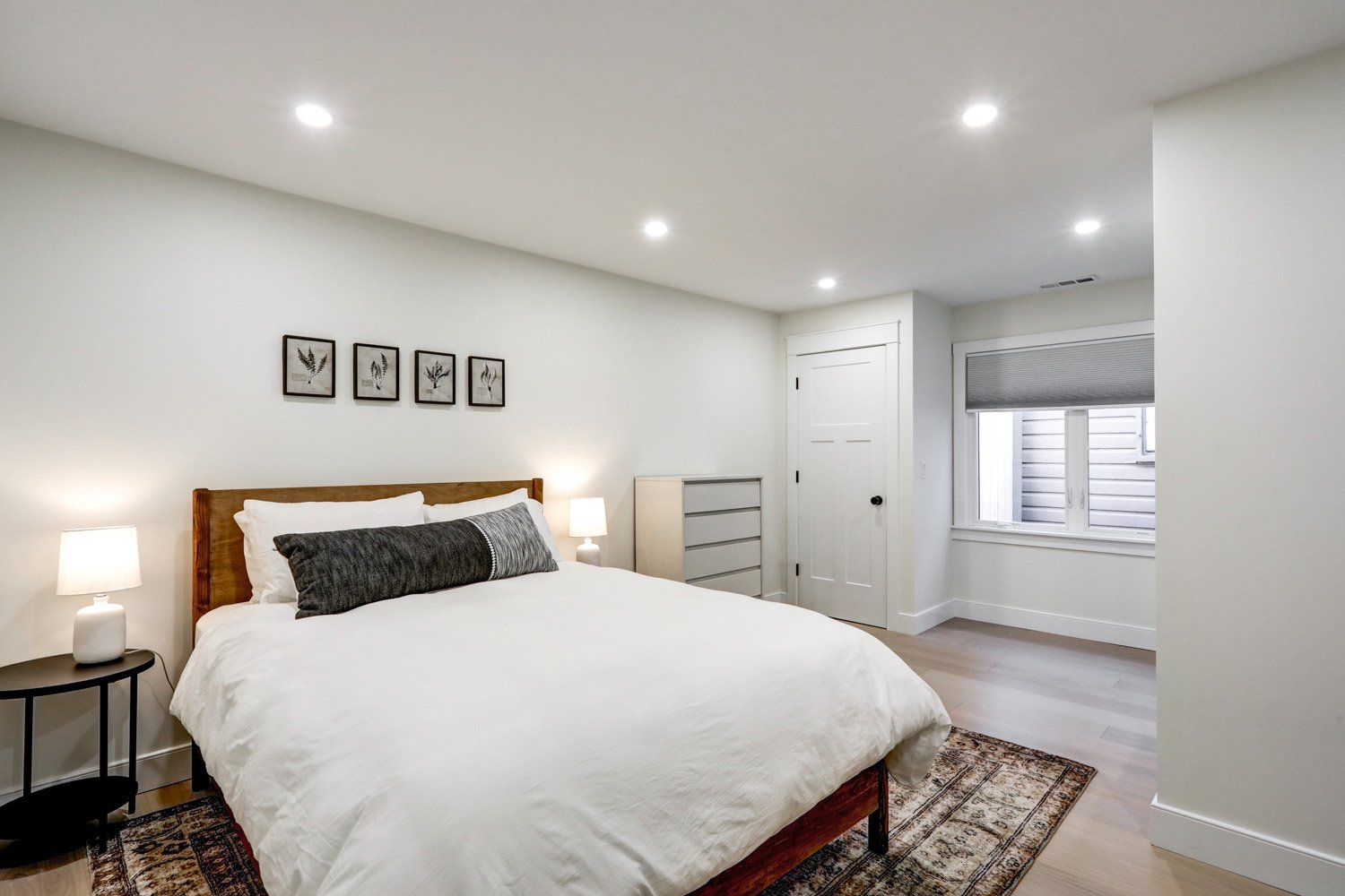Bedroom 5 with a queen bed on the second floor of The Barn 