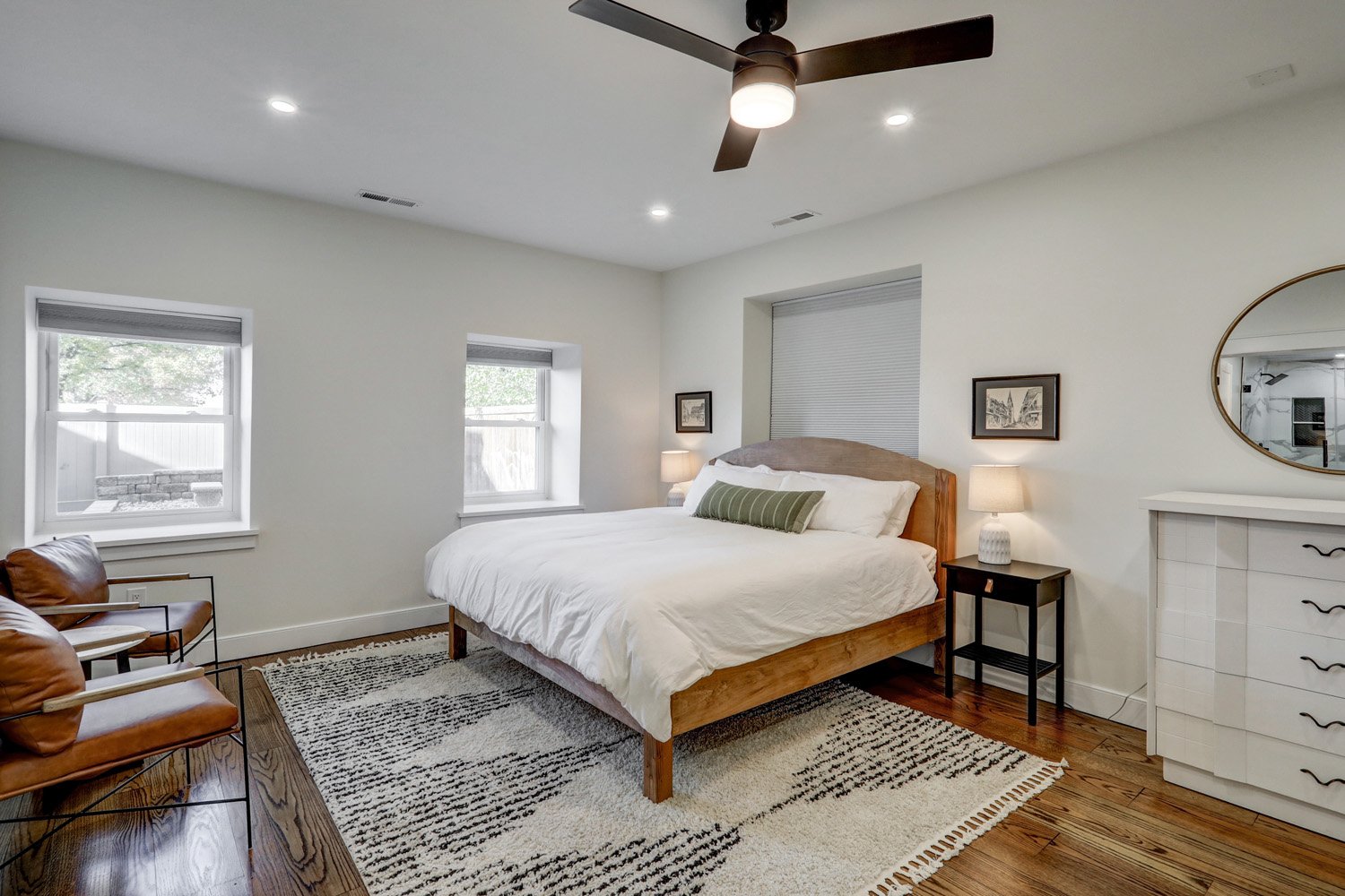 Primary bedroom with a king bed on the first floor of The Barn. No steps or stairs required to access this bedroom from parking lot. 