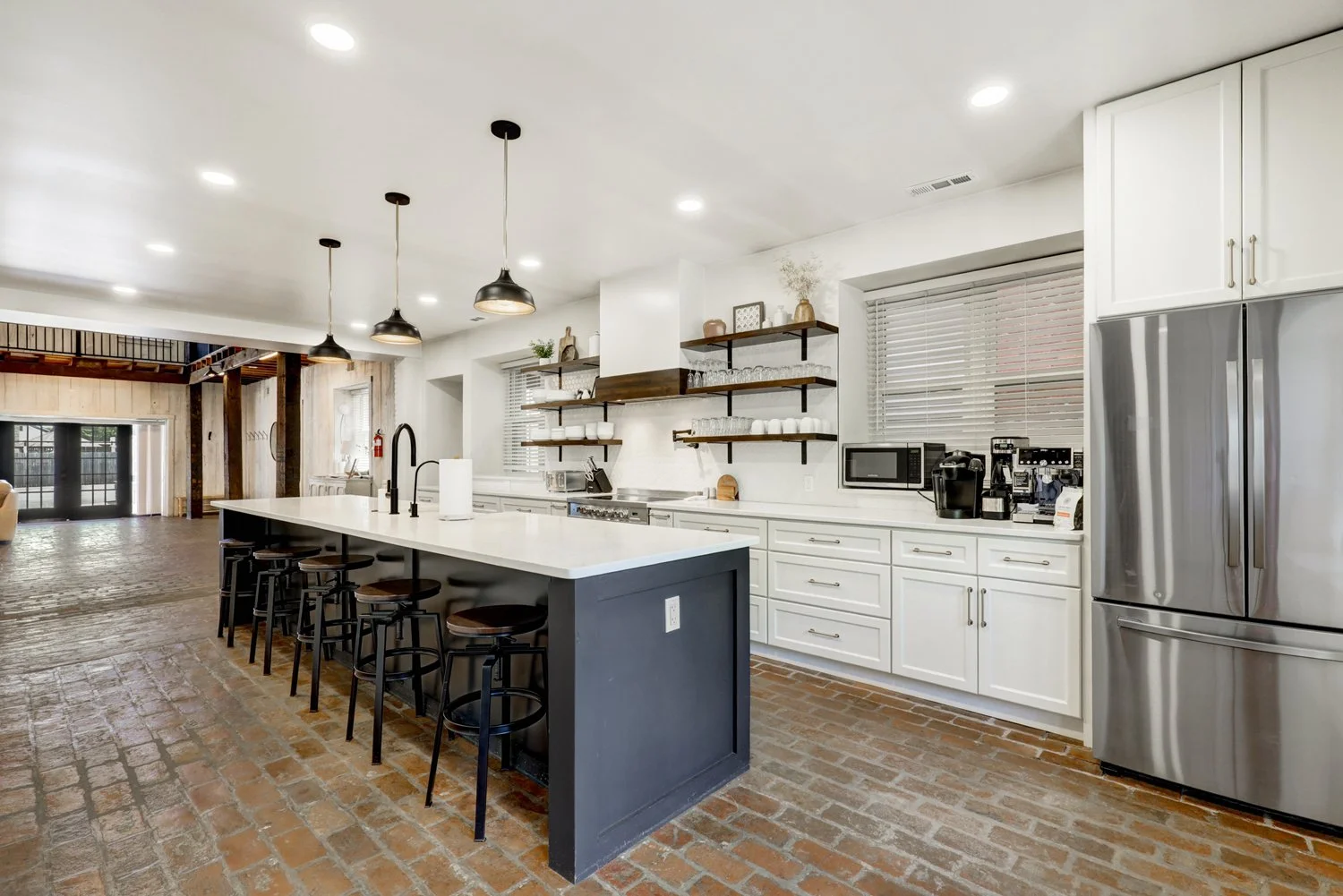 Fully stocked kitchen with cooking essentials. Handheld mixer, Ninja blender, air fryer, waffle maker, electric griddle, & panini press available to use.