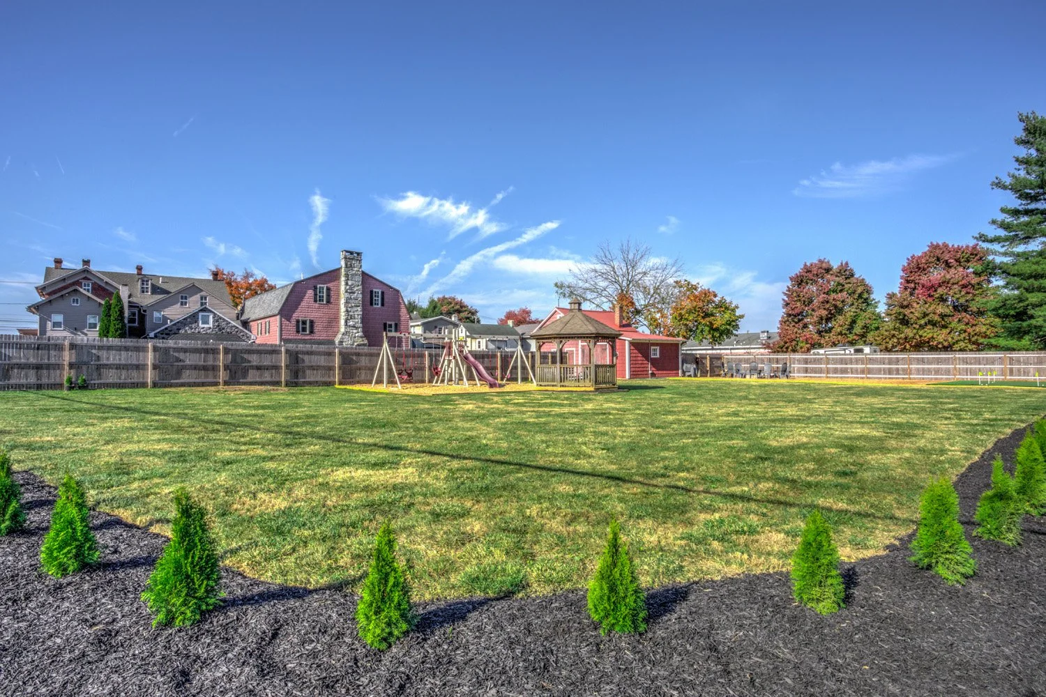 Large yard is common area available for all guests of Legacy Manor