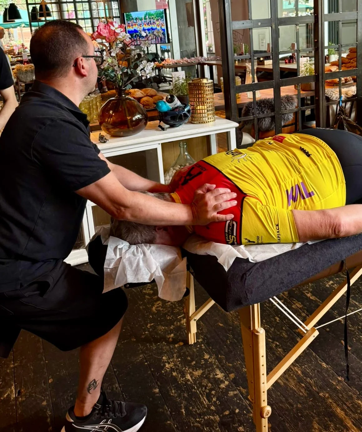 Lower neck traction on cyclist
