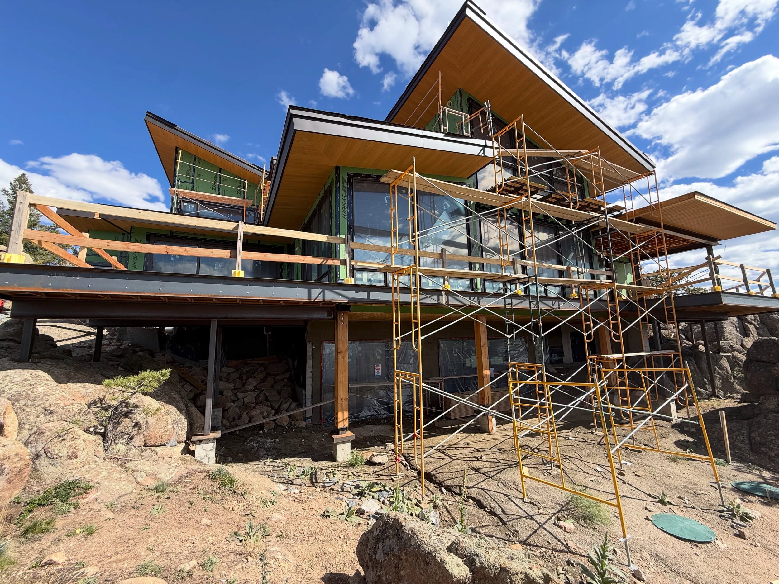 Cliffside is almost buttoned up! That last or the windows are going in. The siding and mason crews are working their way around the building. Just in time for winter! #luxury #mountainlife #heart #build #architecture