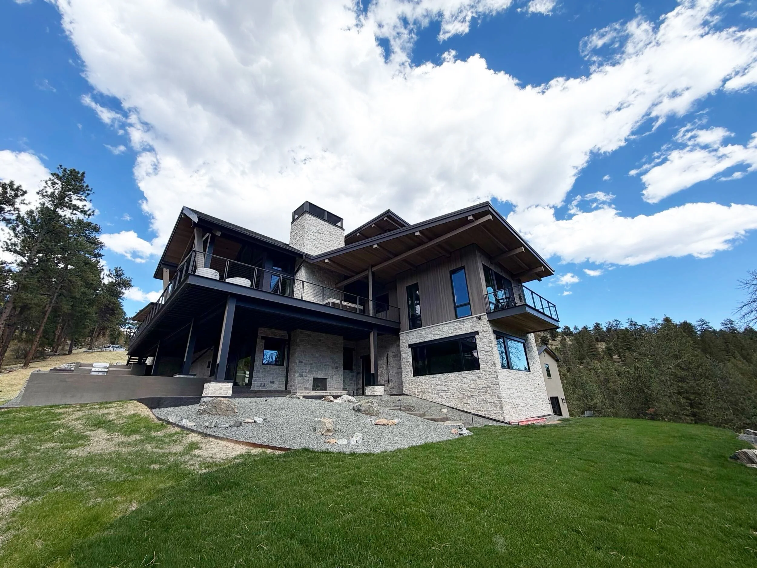 Blue Sky Valley just keeps getting better with every passing week. The landscaping adds a nice clean touch to the exterior. #customhome #buildcolorado #luxuryhomes #architecture #design