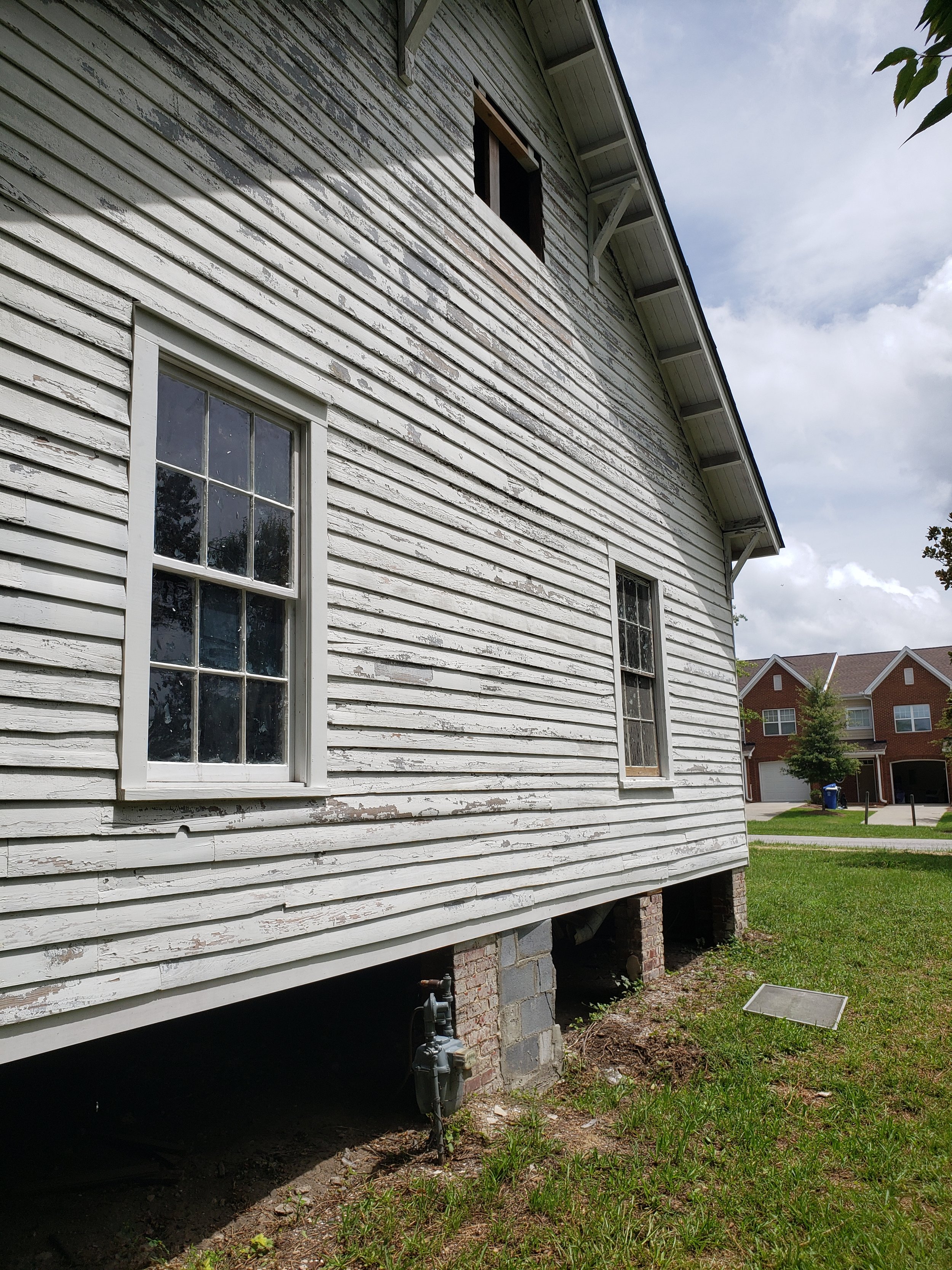 mill house in Columbia - remade windows and repaired siding.jpg