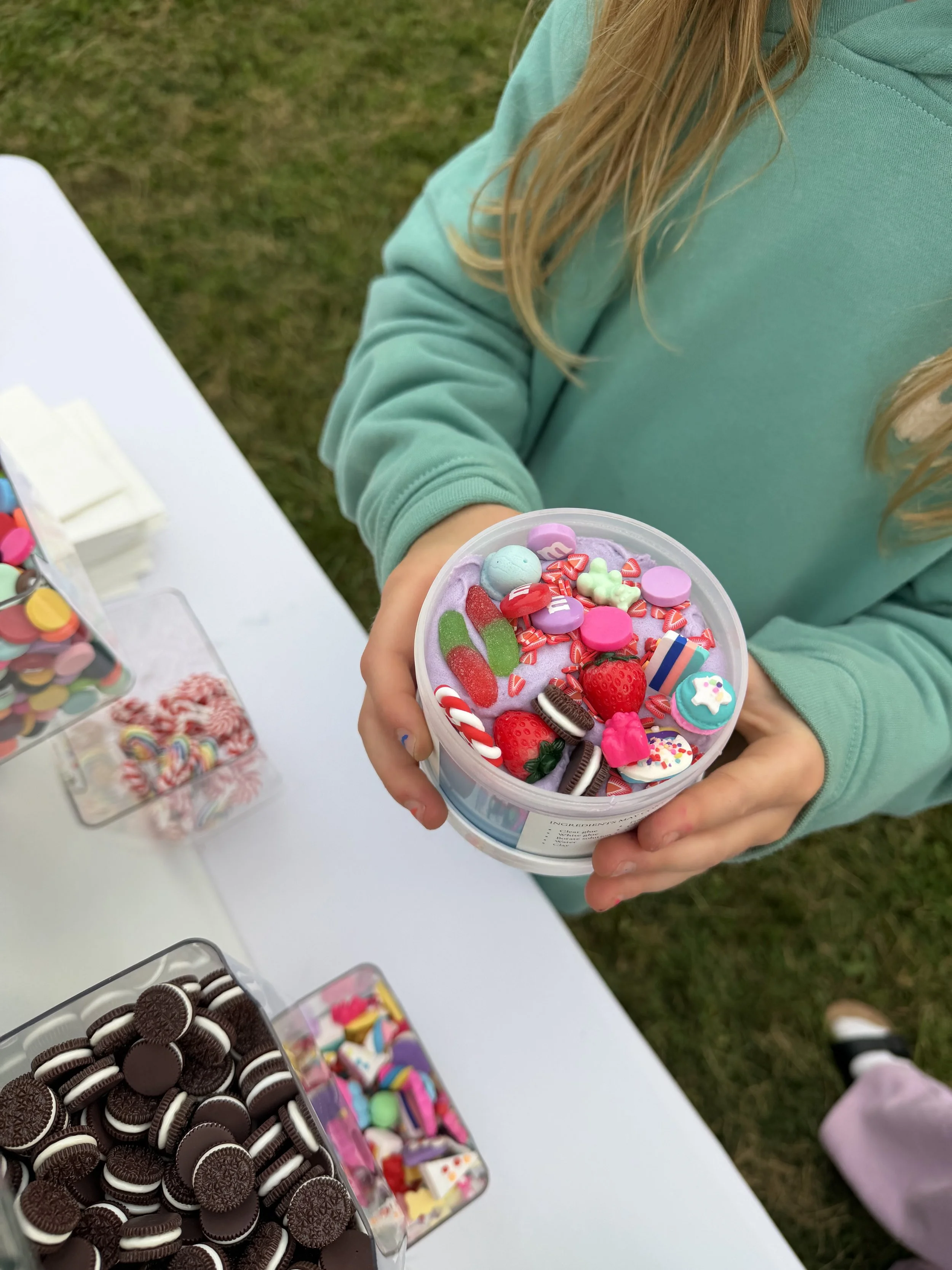 A colorful custom slime creation with toppings.