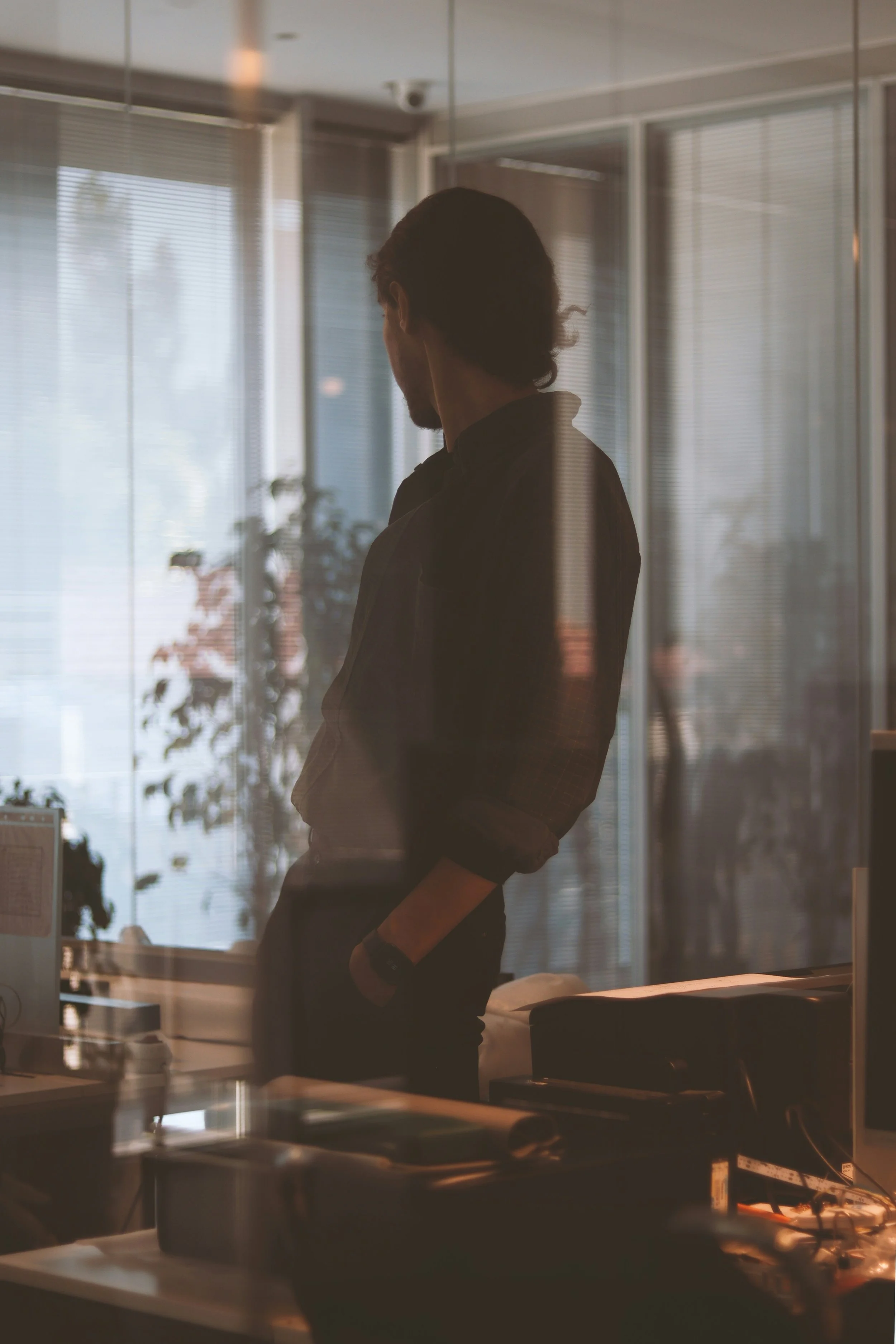 Founder working alone in an empty office at night, a common setting for founder burnout