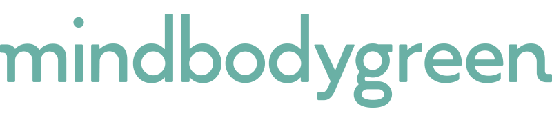 The word 'mindbodygreen' in lowercase letters with a mix of teal and black colors.