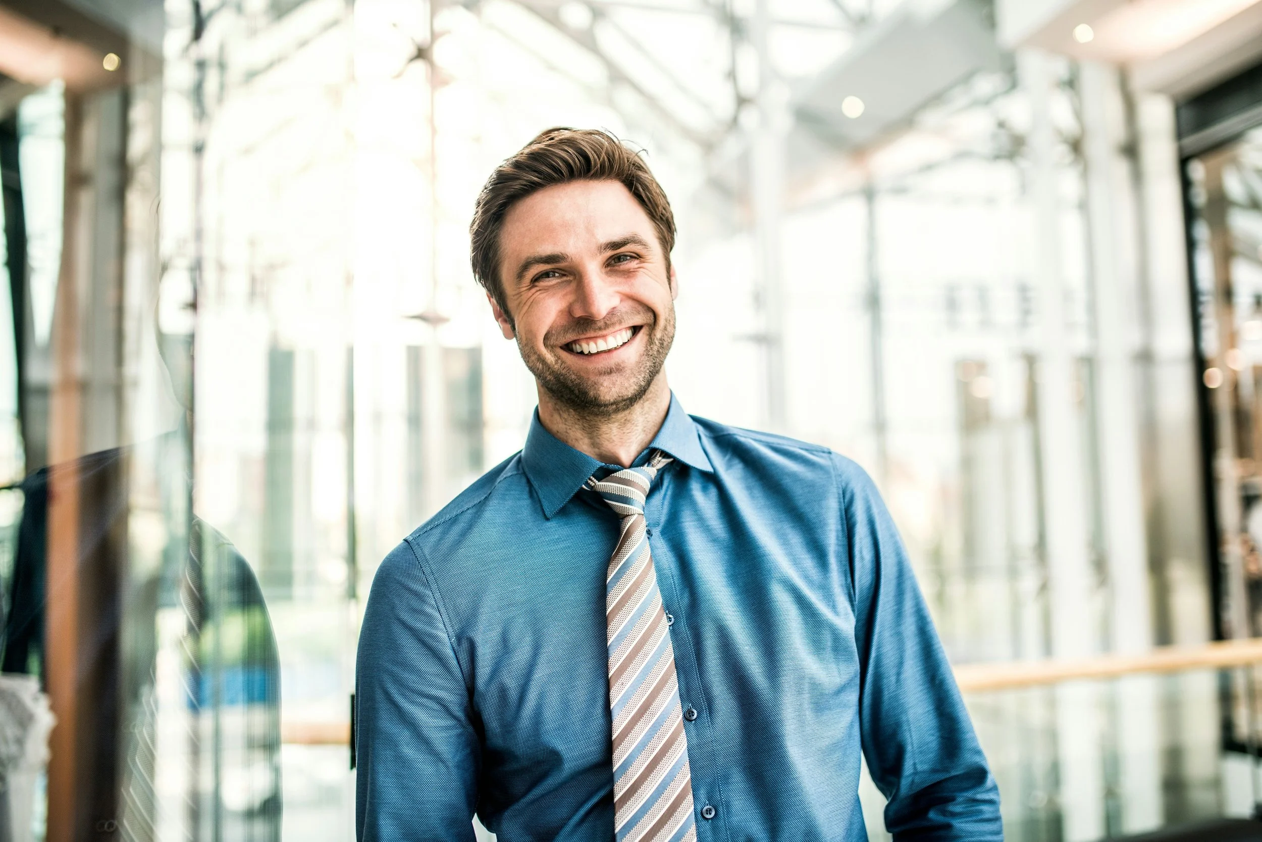 Picture of a happy professional symbolizing the effects of therapy for burnout