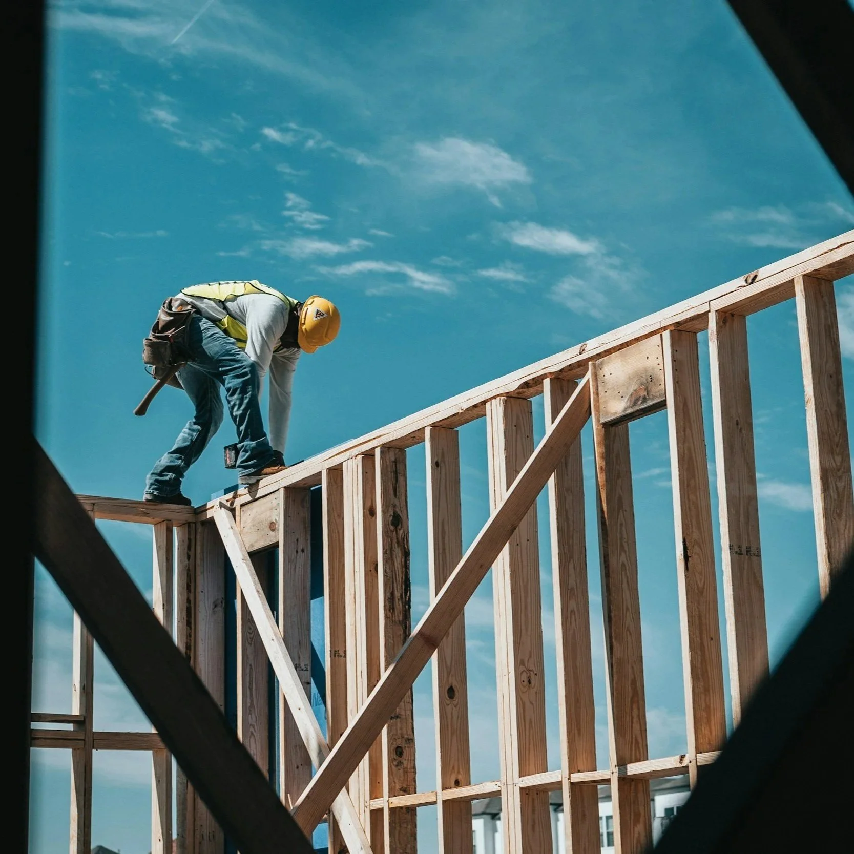 Construction worker building frame for buidling