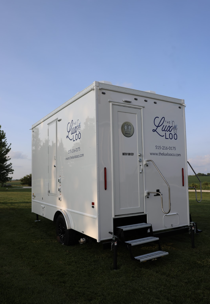 Four-stall luxury restroom trailer ready for an event