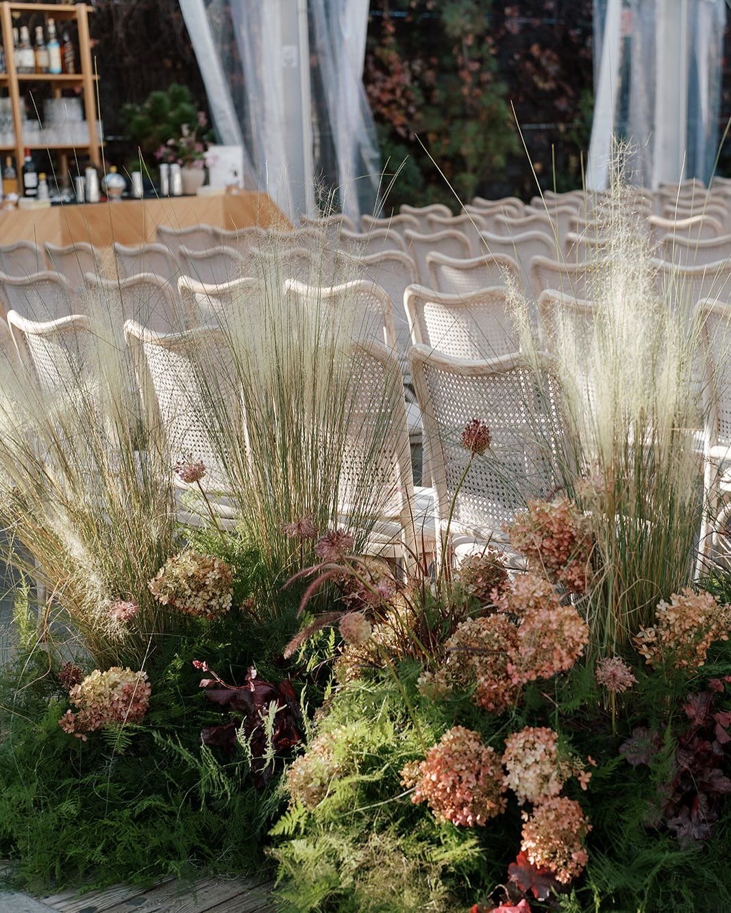 wild flowers and grasses wedding ceremony chairs