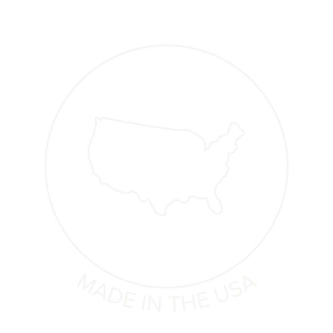 Circular logo with a white outline of the United States map inside, curved text below reading 'MADE IN THE USA' on a black background.