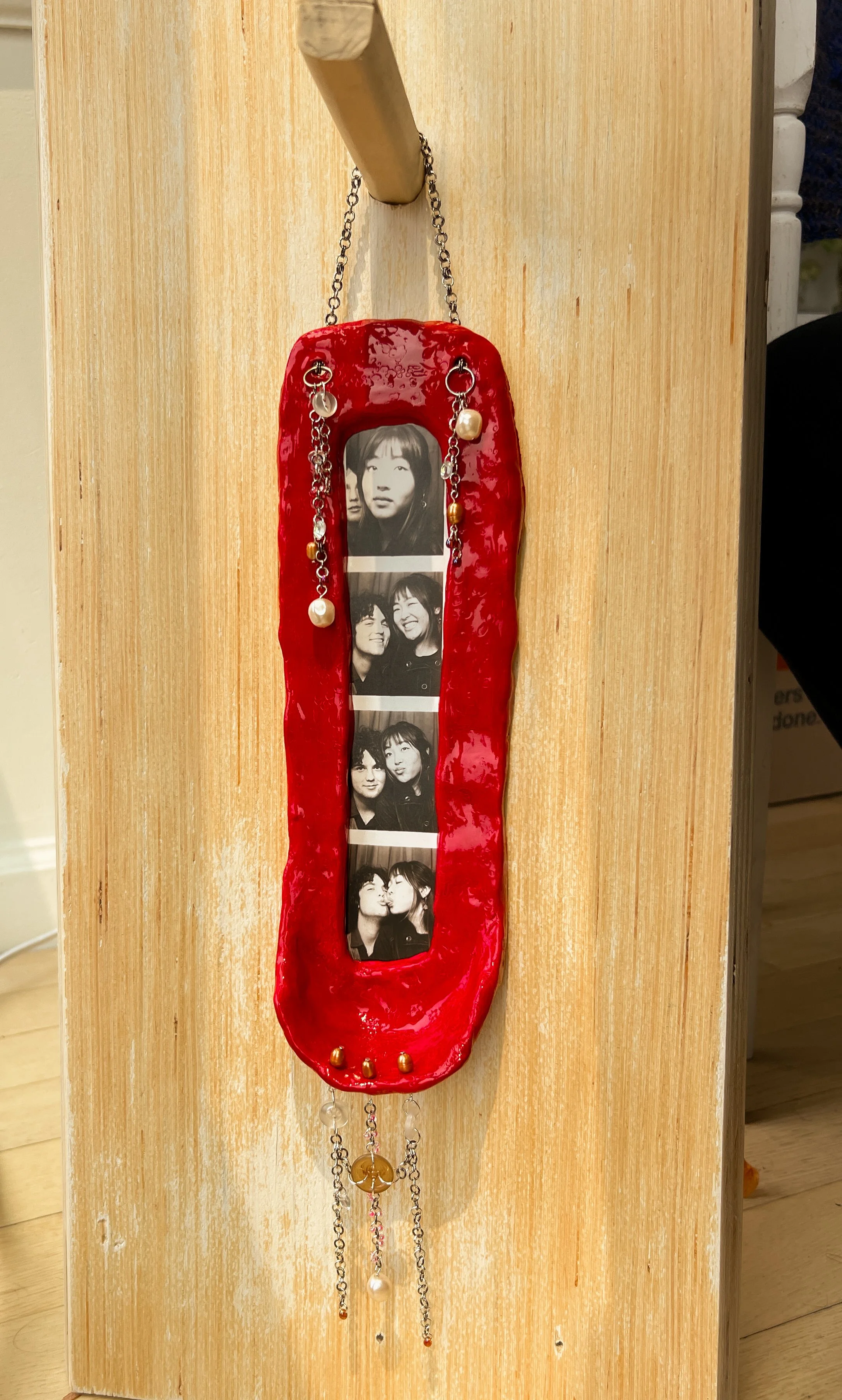 ceramic photo frame with hand-linked details