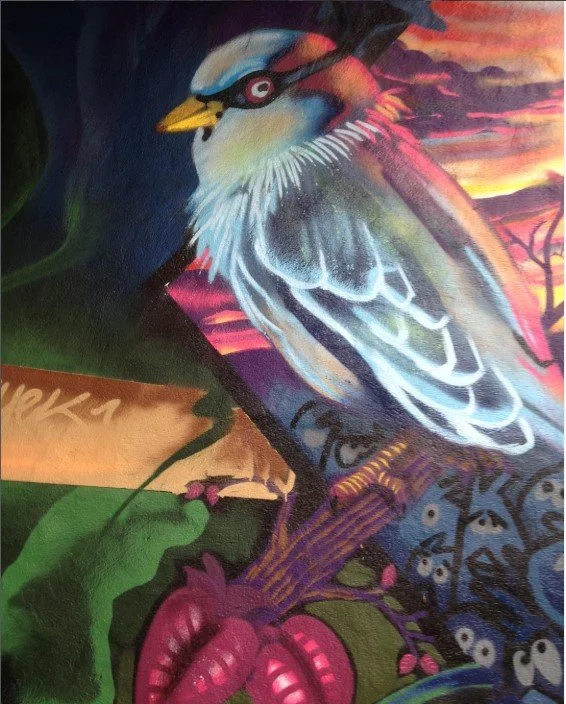 Colorful artwork of a bird perched on a branch with a vibrant sunset background. Art, street art, painter, mural, graffiti, spray paint, oil paint, montreal, commission, Futurism, retro Futurism, cyber punk, punk, blockchain,block chain, NTF, Propaga