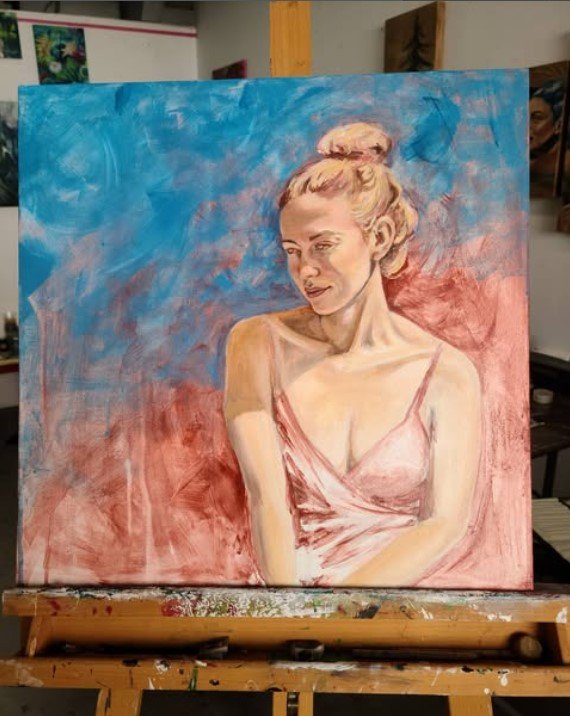 Painting of a woman with blonde hair styled in an updo, wearing a pink dress, on an abstract background of blue and reddish tones.