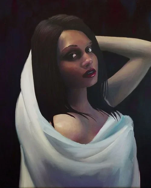 A woman with dark hair, dark lipstick, and dark eye makeup, wrapped in a white cloth, looking over her shoulder with one arm raised behind her head.