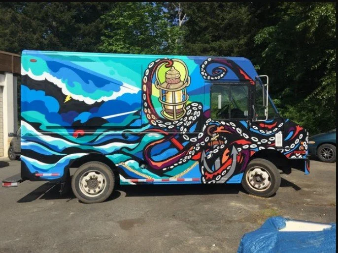 Colorful truck with ocean wave and octopus mural