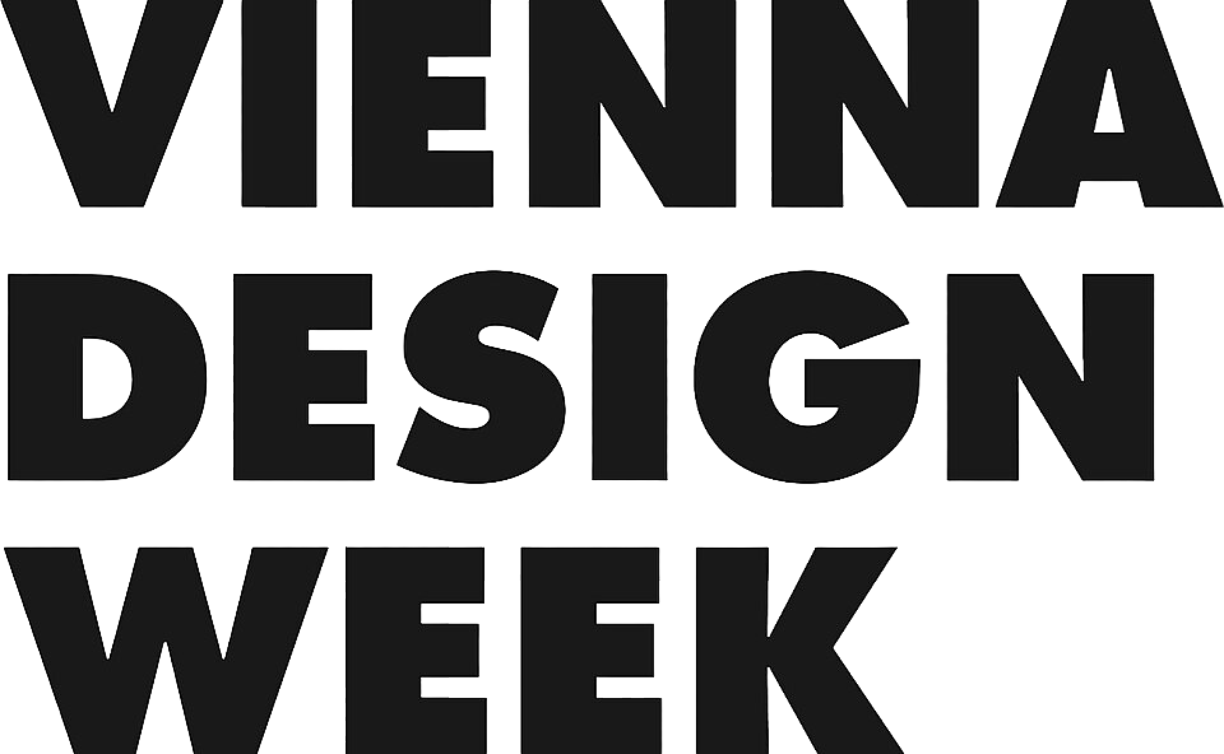 Close-up of black bold text that reads 'VINTAGE DESIGN WEE' on a white background.