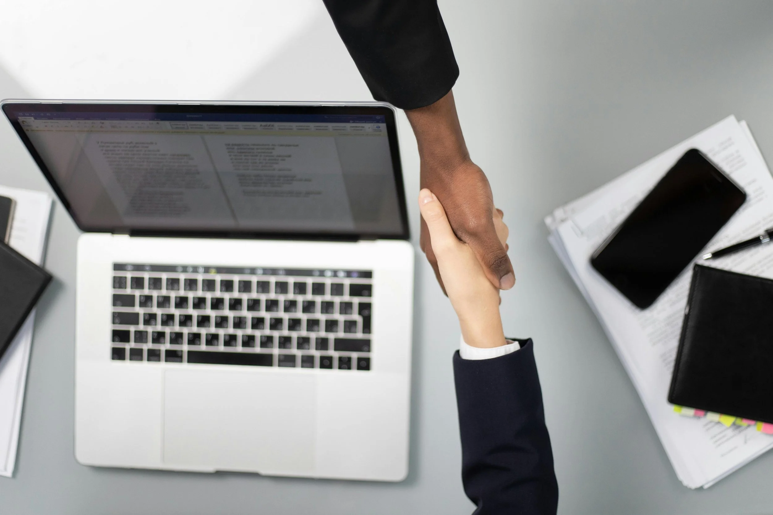Two people shaking hands.
Legal Social Media Marketing Management for Law Firms.