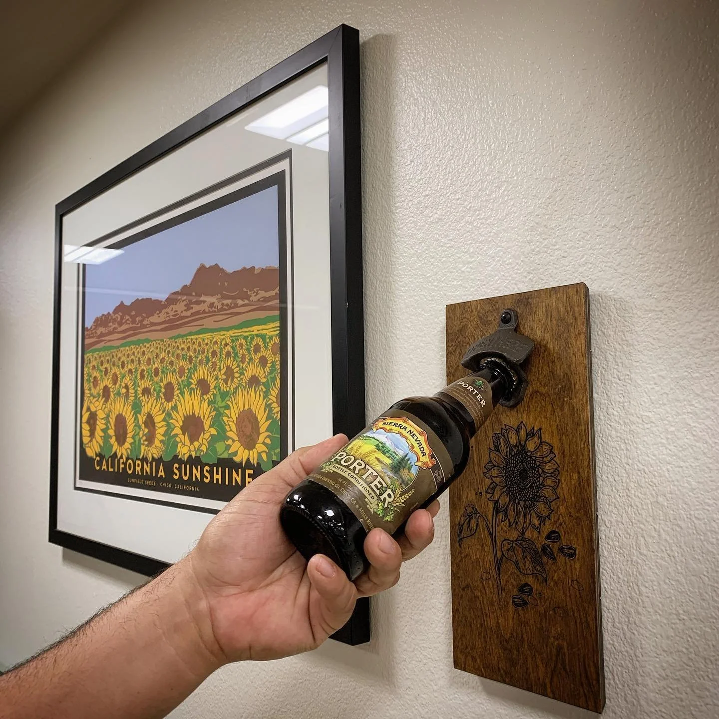 Get your hands on a wall mounted bottle opener. We make many different designs to fit anyone&rsquo;s personality. This design was Inspired by this sunflower print and would look beautiful in any home. 
🌻🌻🌻🌻

#functionalart  #sunflower #reclaimed 