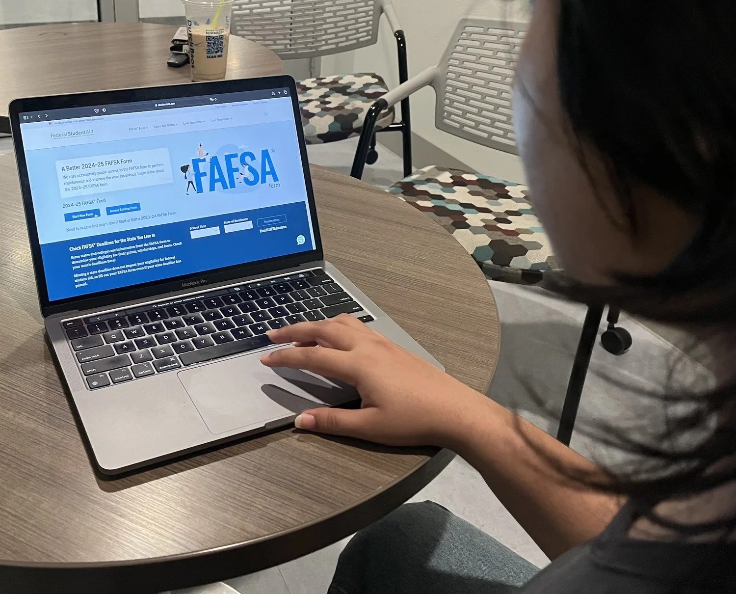  This is a photo illustration of Mahek Rawat, biochemistry and premed senior at Texas A&amp;M, creating a new FAFSA account and form submission on Feb. 24, 2024, in College Station, Texas. Rawat said she did not receive a substantial financial aid pa
