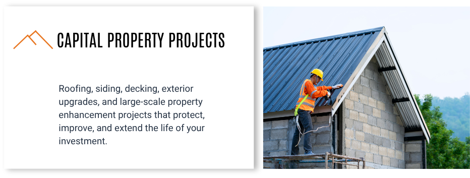A construction worker wearing a yellow helmet and orange safety vest installing metal roofing on a building with concrete block walls, with trees in the background.