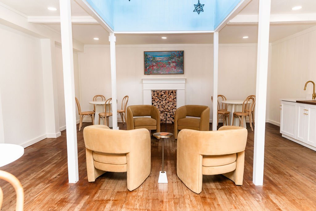 Tables and chairs inside Leigh's event space