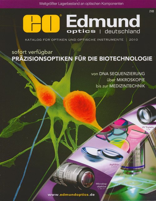 Cover of Edmond Optics catalog showing a close-up of a neuron with green and orange colors, and images of optical instruments including lenses and microscopes.
