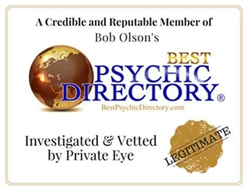 A business card for Bob Olson's Psychic Directory, stating he is a reputable member, investigated and vetted by Private Eye, with a gold stamp labeled 'Legitimate'.