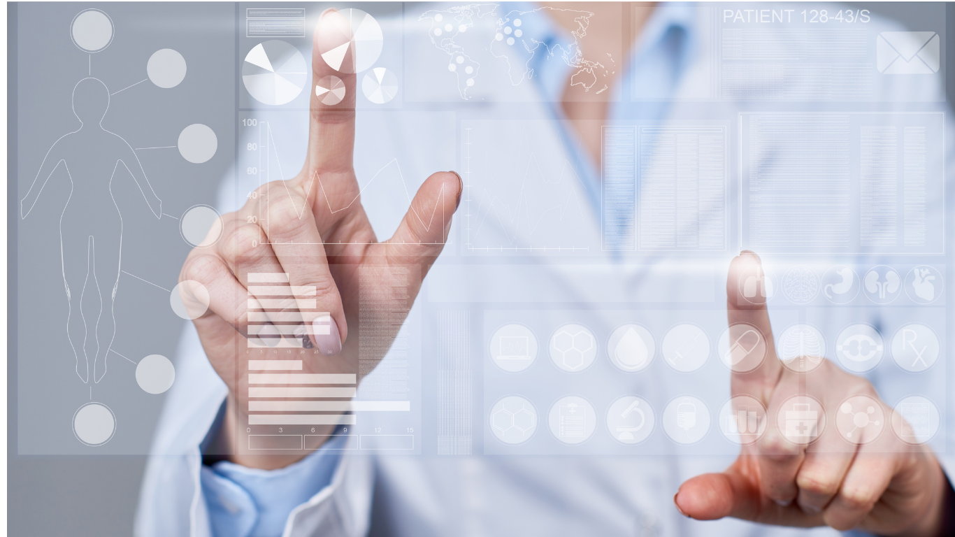 A healthcare professional interacting with a transparent digital touchscreen displaying medical data and graphs, wearing a white lab coat.