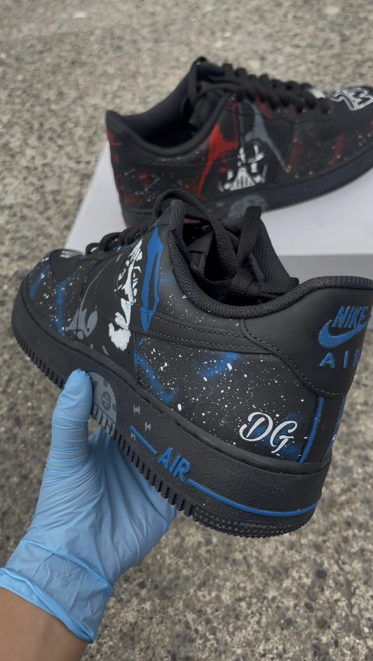 Blue galaxy detailing and custom Star Wars themed artwork on black Nike Air Force 1