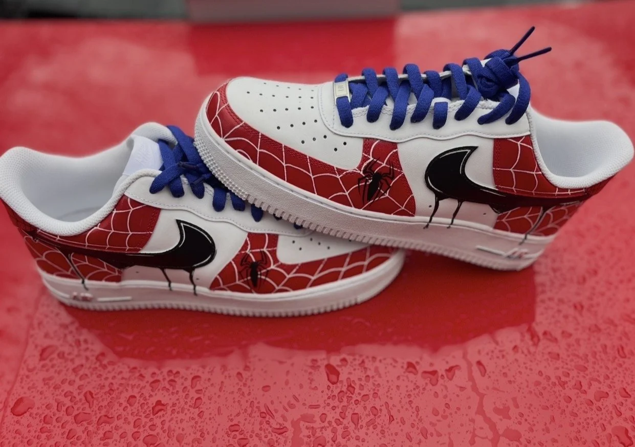 Pair of Spider-Man themed custom Air Force 1 sneakers painted by hand