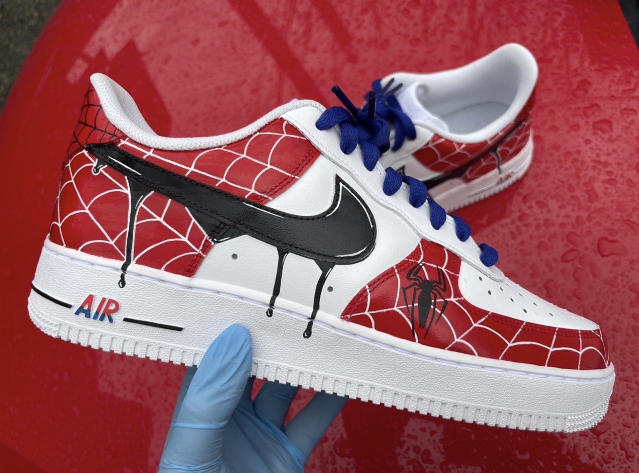 Finished Spider-Man custom Air Force 1 sneaker featuring comic-inspired artwork and web details