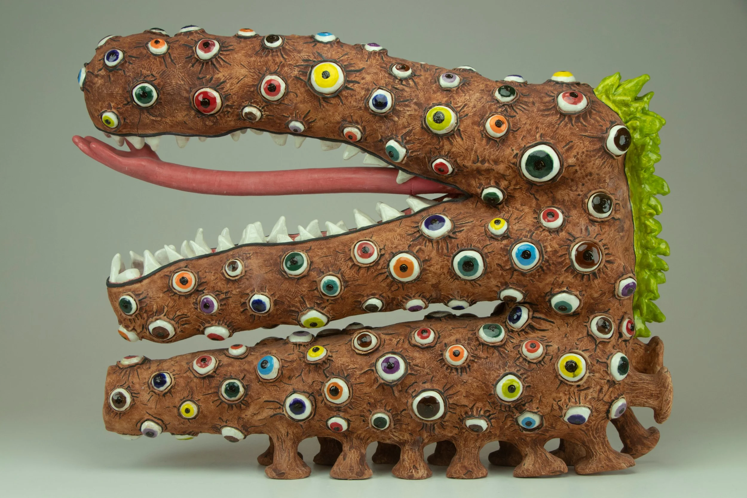 Multi-eyed creature with Hand Tongue I Ceramic, Underglaze I 63 x 15 x 40 cm I 2022-2021