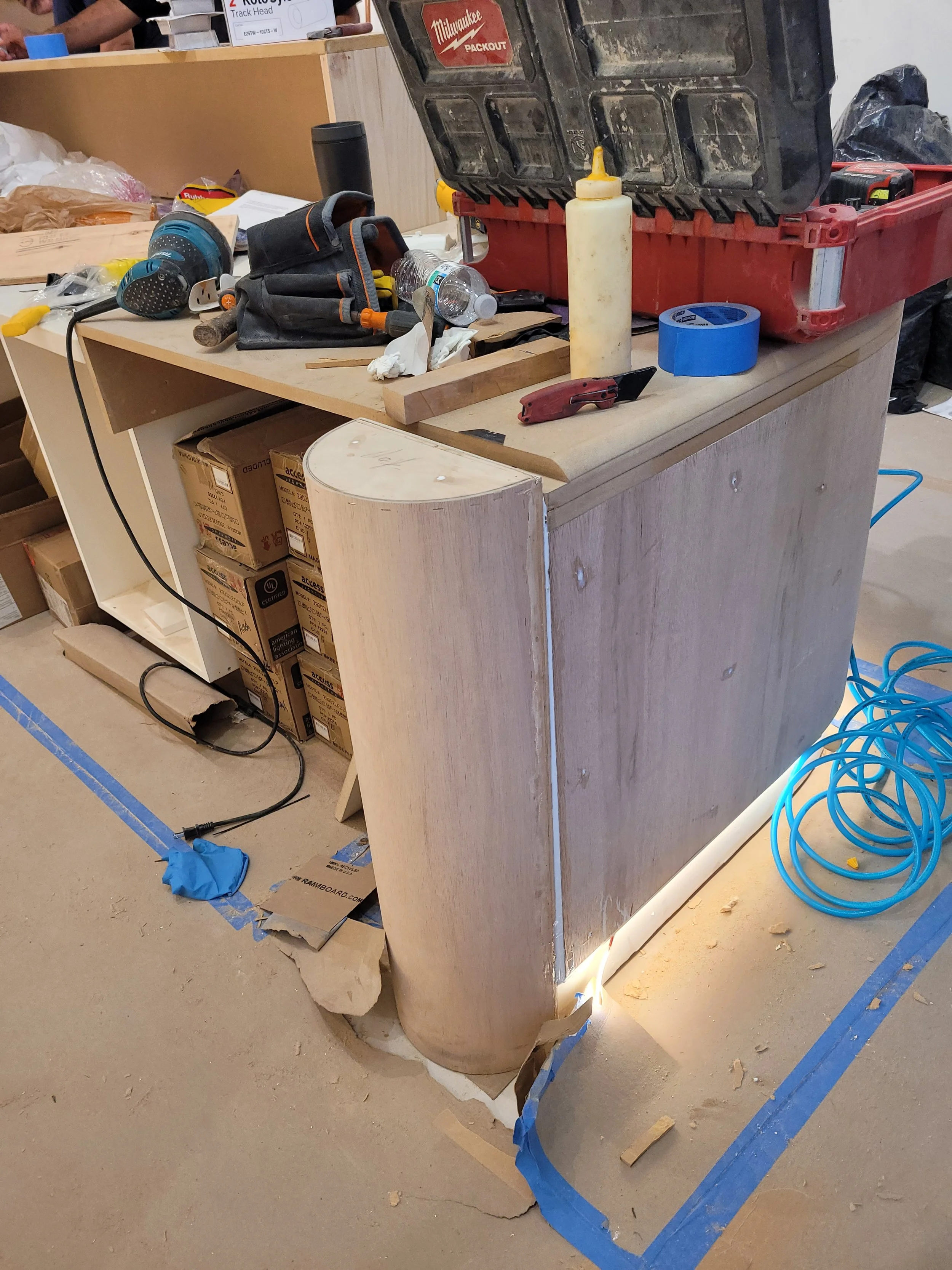 custom-wood-long-reception-desk-corner.jpg