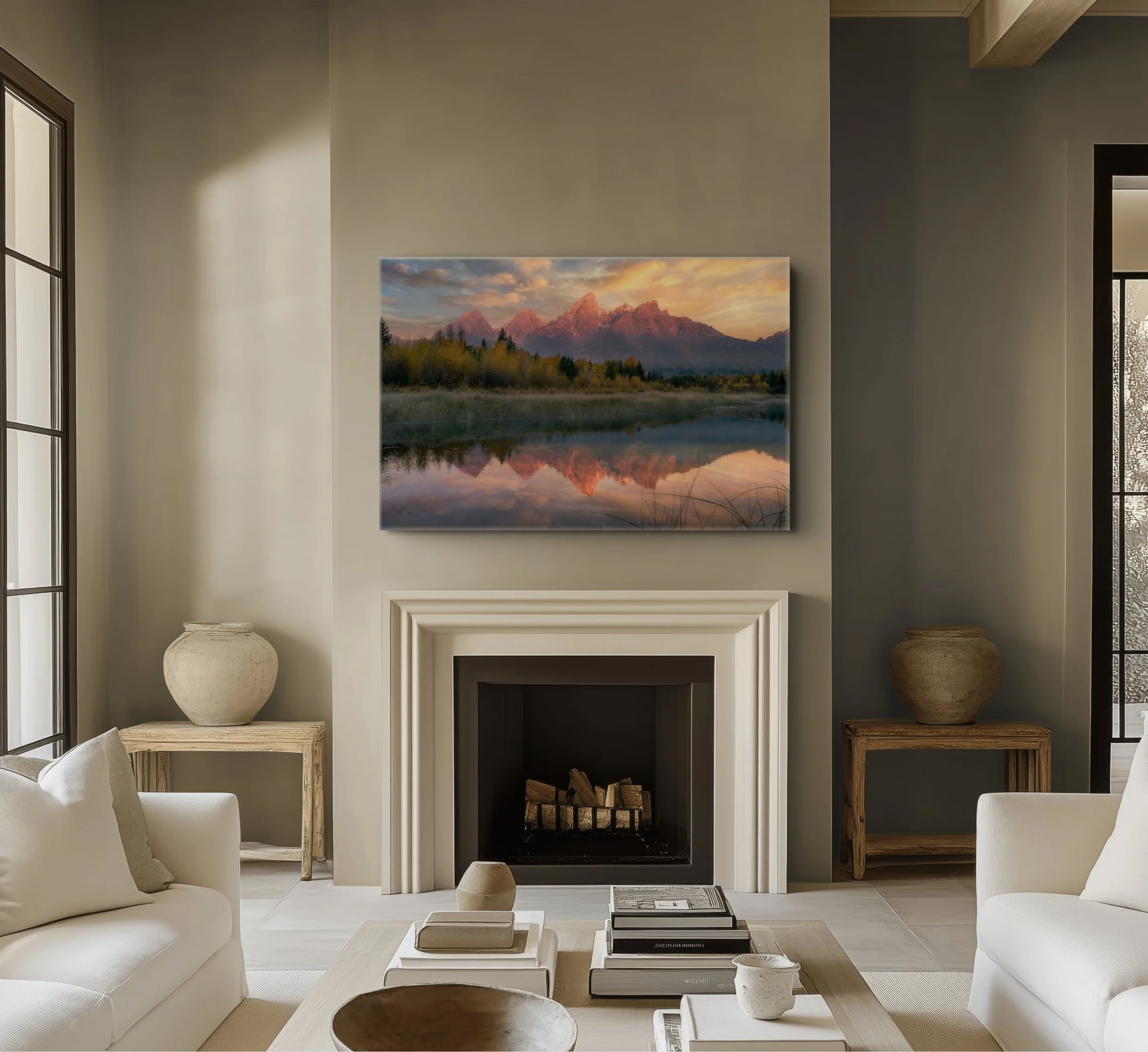 An image of Stan Dunlaps print of the Tetons at sunrise printed as a gallery wrap hanging in an upscale living room